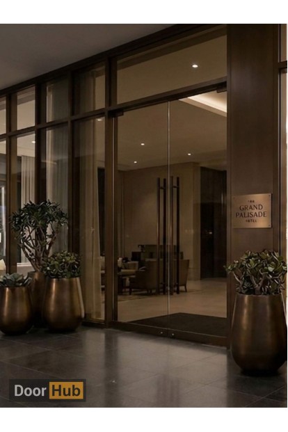 Tinted Glass Pivot Door 10mm UAE for Luxury Hotel Suite Entrances